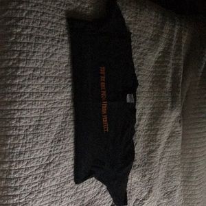 Men’s large tee shirt.